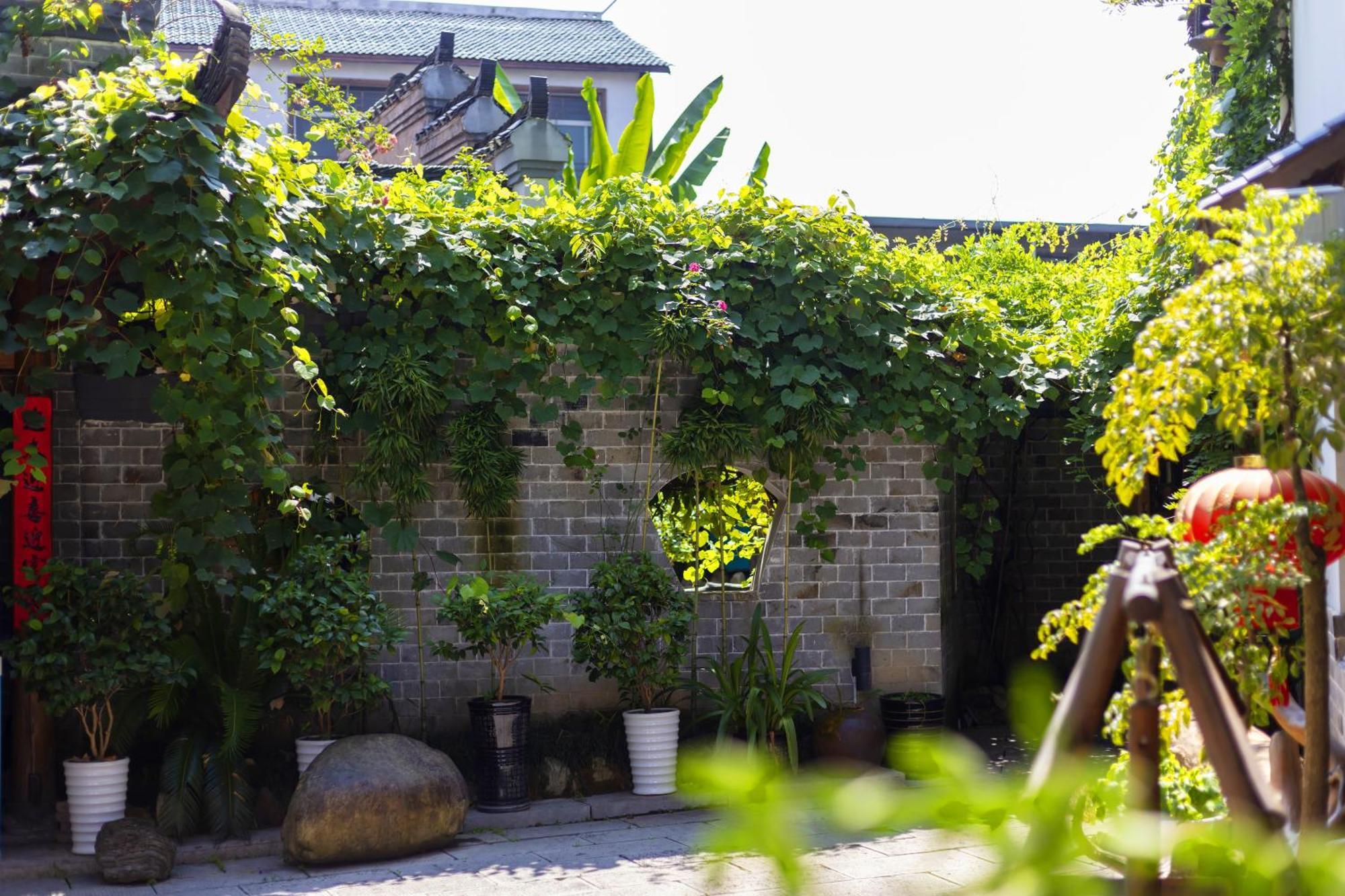 Butterfly Flowers Inn Zhangjiajie Εξωτερικό φωτογραφία